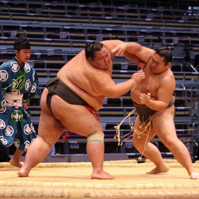 Fukuoka: Sumo Wrestling Tournament Chair Seats & ExpertGuide - The 3:20 PM nakabi ceremony gives the afternoon a lift