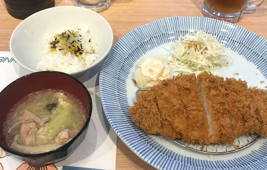 Tokyo: Challenge Sumo Wrestlers and Enjoy Meal - Putting on the costume and facing a sumo wrestler