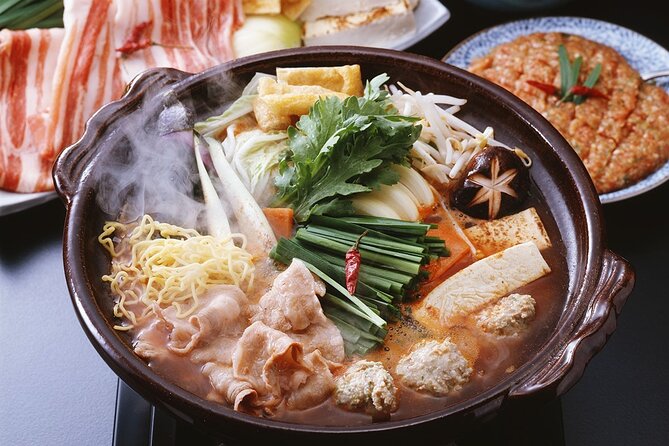 Tokyo Sumo History Tour with Chanko Nabe Lunch - Ekō-in Temple and the Chikara-zuka Monument
