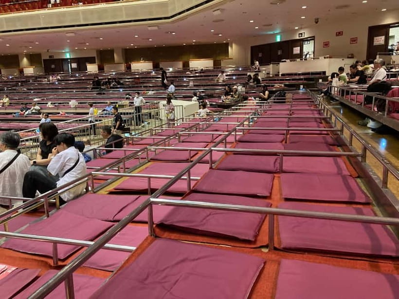 Tokyo: Watching Sumo and Ryogoku Area Walking Tour - The Sumo Photo Museum in a short guided visit